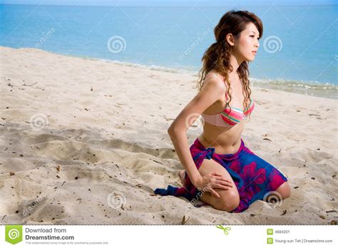 Woman Kneeling On The Beach Stock Image Image Of Summer Woman 4684201