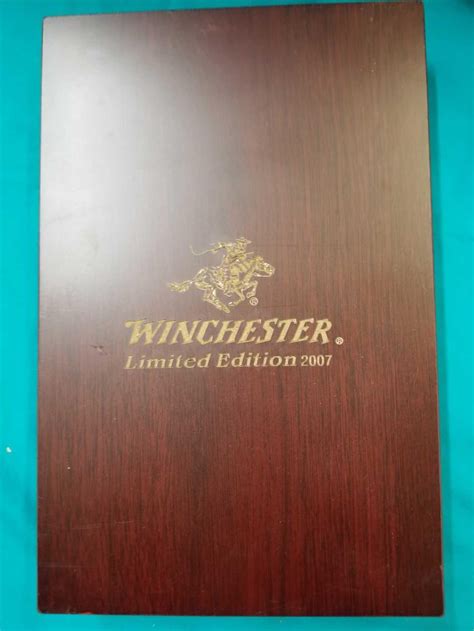 5 ¾ open and 3 3/8 closed. WINCHESTER LIMITED EDITION 2007 3 KNIFE SET IN A WOODEN BOX