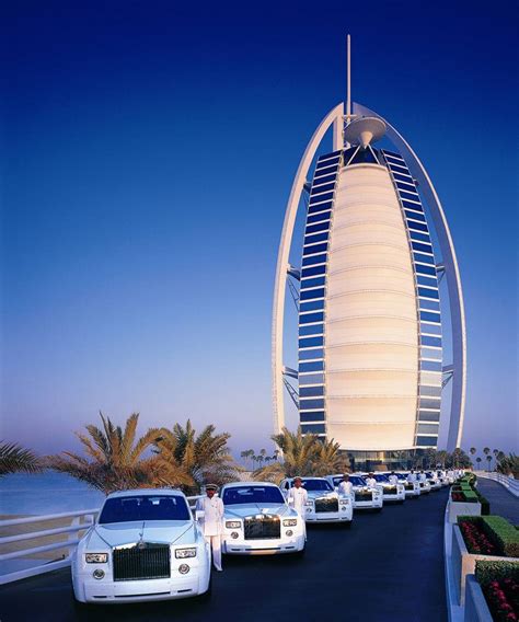 A Fleet Of Rolls Royce Phantoms With Dubais Most Luxurious Hotel Burj