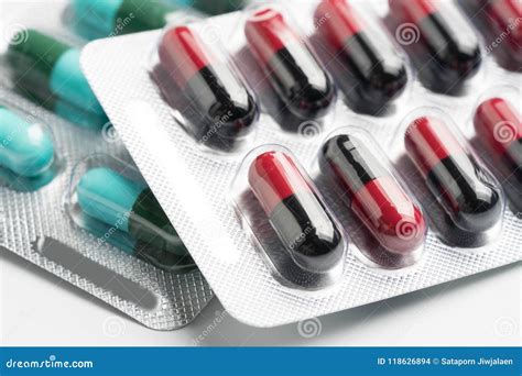 Selective Focus Of Antibiotic Capsules Pills On Blur Background Stock