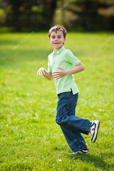 Boy Running On A Meadow — Stock Photo © Xalanx 2894476