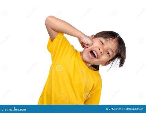 asian girl making a funny face with one hand punching her cheek portrait of a cute girl