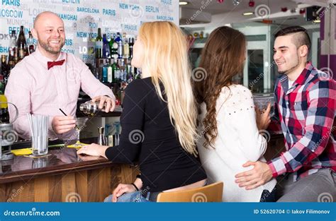 Group Of People In A Bar Stock Photo Image Of Group 52620704