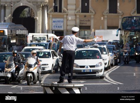 Traffic Policeman Directing Traffic In Rome Italy Stock Photo 18524115