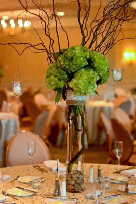 elevated centerpieces natural corkscrew willow green hydrangeas sprayed burlap meets lace