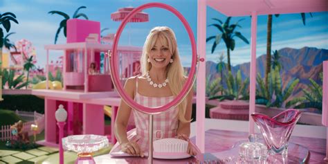 Theres A Lot Of Symbolism In One Of Margot Robbies Outfits In ‘barbie