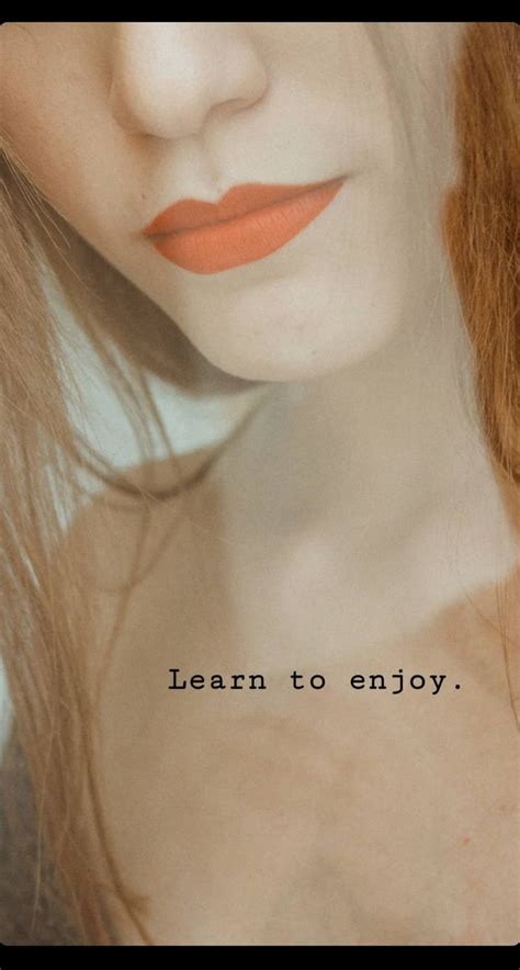 A Woman With Red Hair And Orange Lipstick Has The Words Learn To Enjoy