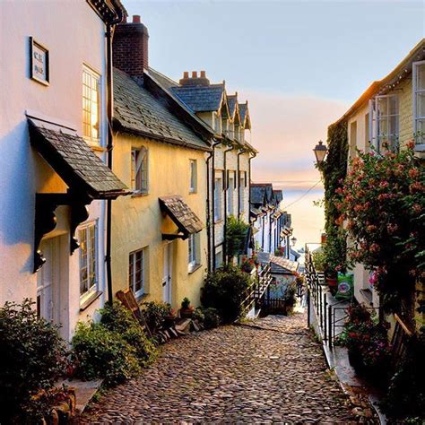 The Cobbled Streets Of Clovelly A Fishing Village In North Devon Are