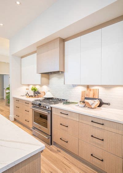 Do you assume white stained oak kitchen cabinets seems to be great? Integrated under cabinet lighting, white oak and white flat panel cabinets keep things clean and ...