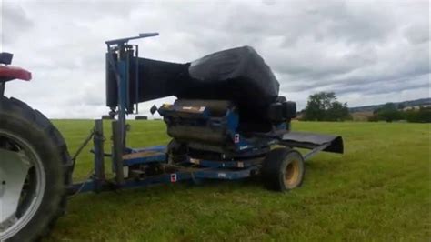 Tanco 1060a Square Bale Wrapper In Action Youtube