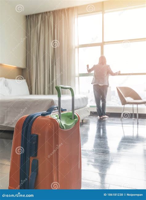 Luggage In Hotel Guest Room With Traveller Lifestyle Of Business Woman