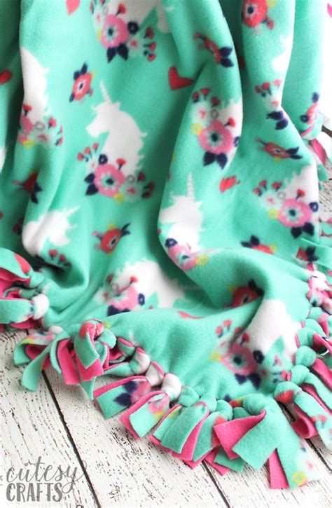 And to make the blanket extra warm, can i put something in between the two layers of fabric? How to Make a Tie Blanket from Fleece - Cutesy Crafts