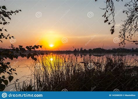 Amazing Sunset Over The Lake Colorful Reflection In The Water Stock Image Image Of Golden