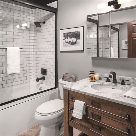 Modern farmhouse style is a style that unite modern color approaches, shapes, and substances together with all the rustic heat of untreated wood switch your clean white and grey bathroom in to modern farmhouse bathroom by incorporating natural wood farmhouse seat like min day architects. Modern Rustic Bathroom | Small farmhouse bathroom, Small ...