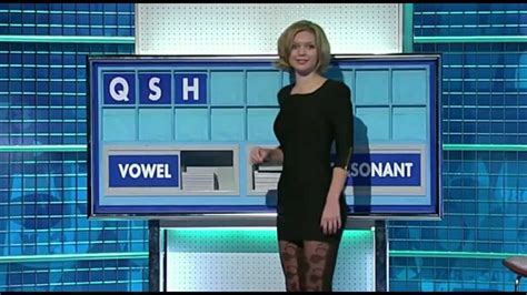 rachel riley showing off her patterned tights short black dress heels youtube