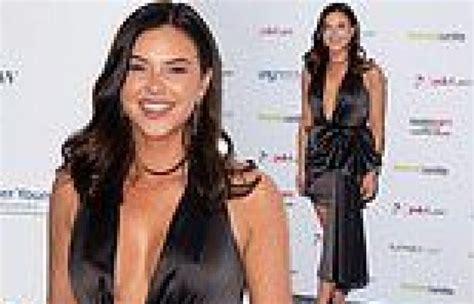 ex towie star shelby tribble puts on a busty display in plunging black mini