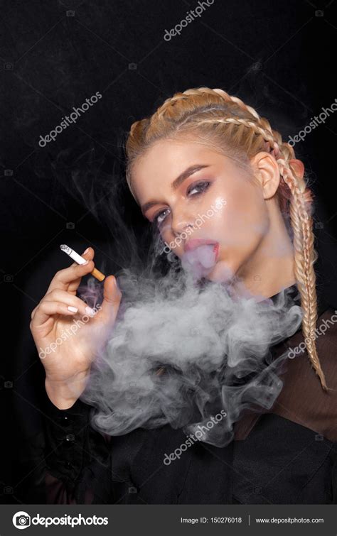 Beautiful Woman Smoking Cigarette — Stock Photo © Johan Jk 150276018