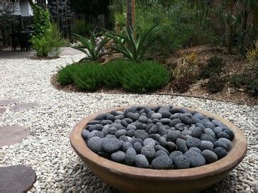 Velg blant mange lignende scener. Modern fire pit with lava rock | . Outdoor Living ...