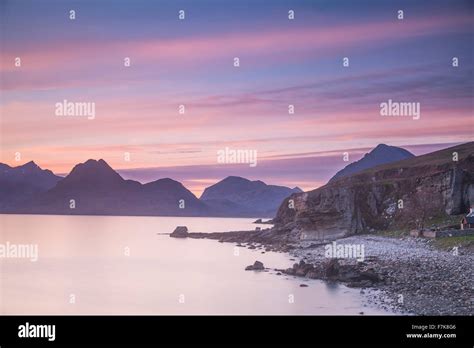 Pink Sunset Sky Over Mountains And Calm Lake Elgol Skye Scotland