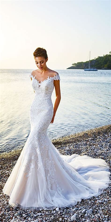 Nothing defines a beach wedding better than a lace dress. 32 Beach Wedding Dresses Ideas to Stand Out! - ChicWedd