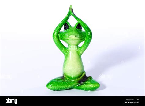Close Up Of Green Frog Figure Doing Yoga Meditation Stock Photo Alamy