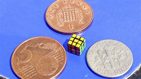 This Tiny Toy Could Be The Worlds Smallest Rubiks Cube Mental Floss