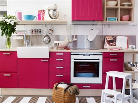 Incorporate pink kitchen accessories across your layout, such as a kettle or toaster, to tie the theme of the room together. Pink Kitchens