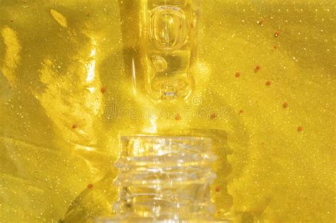 Macro Of Pipette With Liquid Face Serum On Gold Background Stock Photo