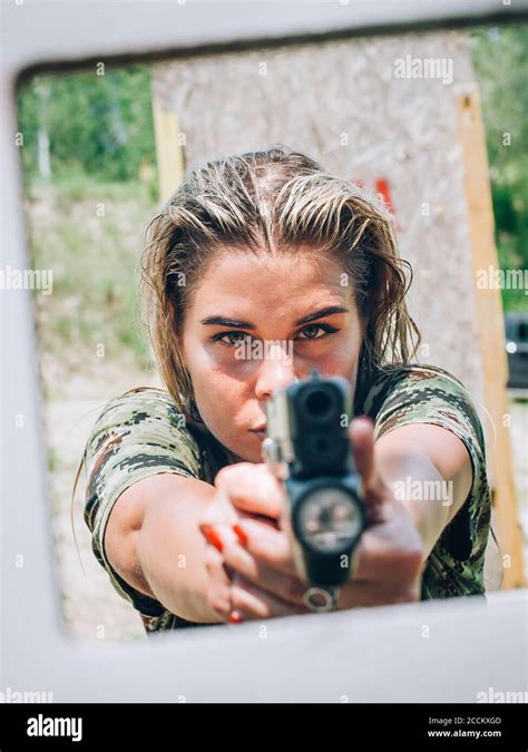 Close Up Abstract View Of Attractive Female Army Soldier Have Gun