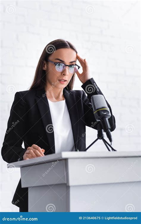 Young Lecturer Suffering From Fear Of Public Speaking Standing On