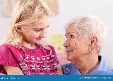 Grandma With Granddaughter Stock Photo Image Of Pink