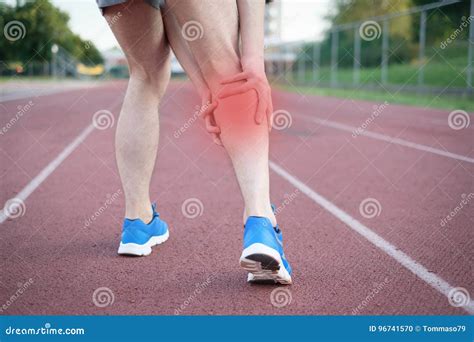 Running Athlete Feeling Pain Because Of Injured Leg Stock Photo Image