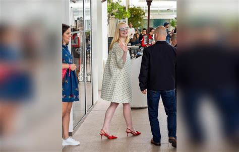 Elle Fanning Wears Loose Dress After Fainting In Cannes