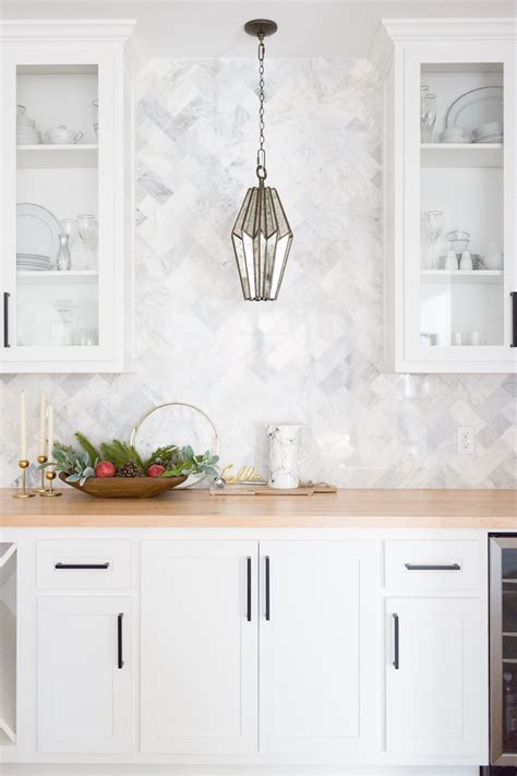 Finger pulls aren't usually mixed with other cabinet styles because they tend to appear in modern, minimalist kitchens. Tulsa Remodel Reveal Modern White Farmhouse | CC and Mike ...