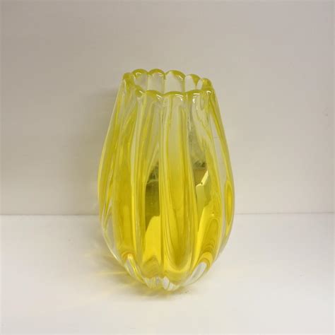 Talisman A Murano Glass Vase With A Bright Yellow Centre And Clear Glass Base