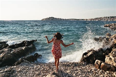 Woman Standing On Seashore Hd Wallpaper Peakpx
