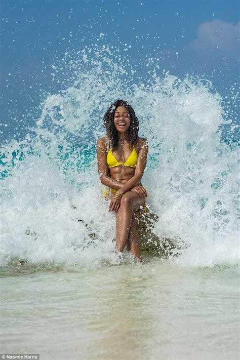 Naomie Harris Shows Off Her Very Impressive Abs In Sizzling Yellow Two Piece Bikini Clad