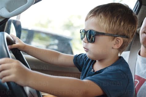 Little Boy Driving Car Stock Photo