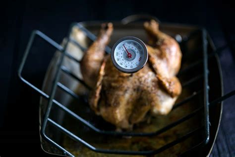 Slice horizontally through the middle, being careful not to cut all. The Correct Internal Temperature for Cooked Chicken ...