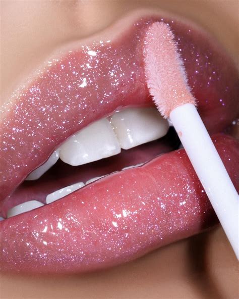 pat mcgrath labs just launched lip gloss lust gloss shown in shade ‘pale fire nectar is a