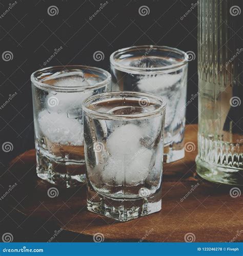 Bottle Of Vodka And Glasses Full Of Ice The Concept Of Alcohol Stock