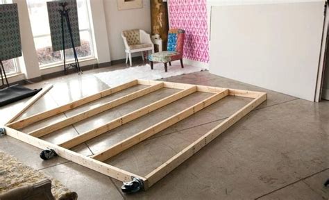 The number of spaces between the different wall pieces is great to keep it light and balance the darkness of the wall. diy movable wall wall dividers on wheels photo 8 diy ...