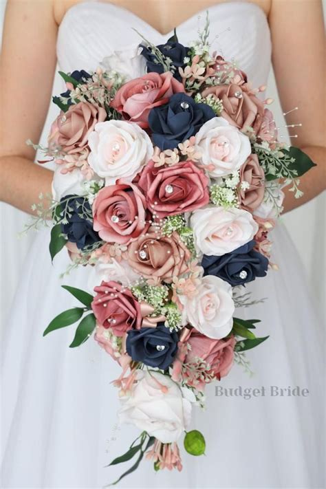This Cascading Bouquet Is Made With Blush Pink Roses Navy Blue Dusty
