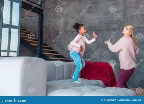 Mother And Daughter Having Much Fun While Dancing Stock Image Image
