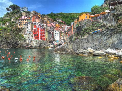 The main town is separated from the railway station and the wharf by tunnels , so it can be said that the town is divided into three parts: Riomaggiore - Cinque Terre Italy | Riomaggiore cinque ...