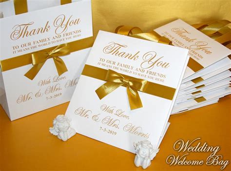 Bridesmaids and groomsmen traveling to a destination wedding need to pack carefully. White/Gold Thank You gift Bags for wedding guests ...