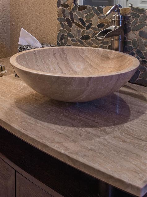 The Vessel Sink Matches The Countertop In This Earth Toned Bathroom For