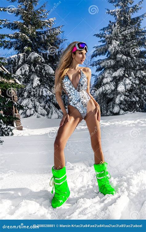 Girl In A Silver Bikini Posing In Winter At A Ski Resort Winter Fashion Model Stock Image