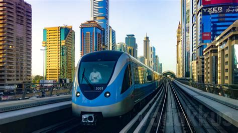 The dubai metro is world's longest fully automated metro network spanning 75kilometers. The Dubai Metro Train on SZR near the Financial Center ...