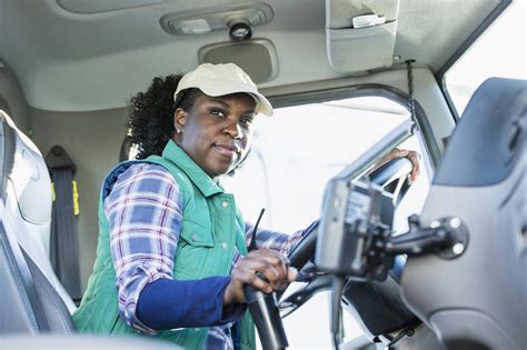 African American Woman Driving A Semi Truck Mindglobal